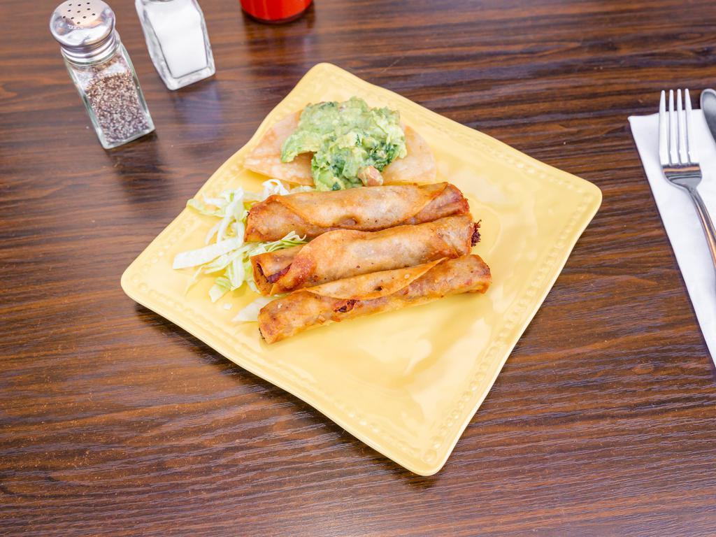 Side Beef Taquitos · 3 crispy taquitos with guacamole.