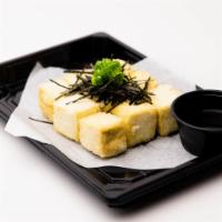 Agedashi Tofu · Crispy tofu 4 pieces, sweet tempura sauce, topped with scallion, and kizame nori.