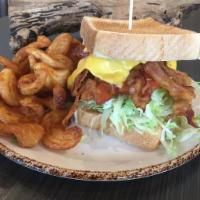 Texas BLT · Bacon, lettuce, tomato, cheese, and mayonnaise. Served on Texas toast with tornado fries.