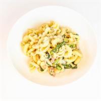Vesuvio con Salsiccia e Rapini · Afeltra vesuvio, sausage ragu, broccoli rabe, and ricotta salata (Contains Wheat, Pork, ³and...