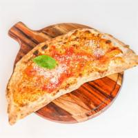 Calzone · Ricotta cheese, salame Napoli, mozzarella di bufala, tomato sauce.