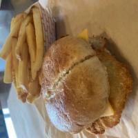 Cod Sandwich & Chips  · One fillet of cod on a toasted wheat bun with Spud tartar sauce & mild cheddar cheese. Serve...