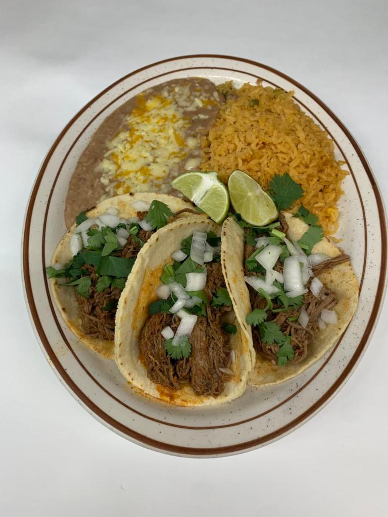 Barbacoa taco plate  · 3 barbacoa tacos served on a handmade tortilla with cilantro and onions. Served with rice and refried beans. 