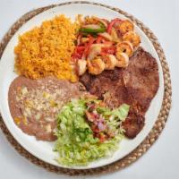 T-bone with shrimp  · T-bone with shrimp served with onions, bell peppers. Served with rice, guacamole salad and r...