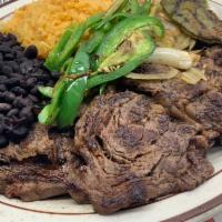Carne parrillada  · Grilled thin ribeye steak served with black beans, rice, grilled onions, Mexican cactus and ...