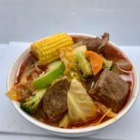 Caldo de Res · Jalapenos, onions, tomatoes, broccoli, cabbage, carrots, potatoes, and beef in a beef stew.