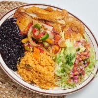 Filete a la Parrilla and Enpanizados · 2 grilled tilapia fillets served with rice, black beans, tortillas, and guacamole salad.