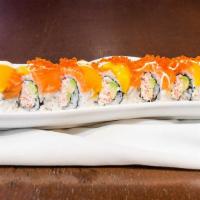 Gold Mine Roll · Crab meat, avocado, mango, tobiko, and salmon with mayonnaise sauce.