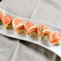 Classic 49er Roll · Fresh salmon, thin sliced lemon, tobiko, and shiso leaf avocado.