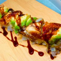 Dragon Roll (2 Tem Shrimp) · Shrimp tempura, cucumber, topped with crab meat, eel, avocado, sesame, and tobiko.