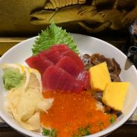 Maguro Ikura Don · Fresh tuna and Ikura over sushi rice.