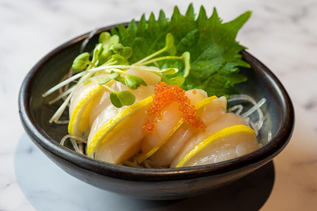 Hotate Sashimi (4 Pieces) · Hotate are one of the more prized shellfish in Japanese cuisine. The best hotate have a firm texture and a sweet, almost creamy taste.