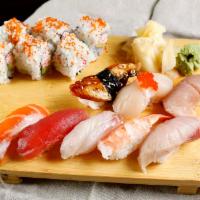 Sushi Regular · 8 pieces of chef's choice nigiri sushi, California roll. (blue fin maguro, hamachi, sake, sh...