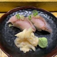 Saba Nigiri · It is rich and has a strong flavor. Saba is usually cured for many hours with salt and vineg...