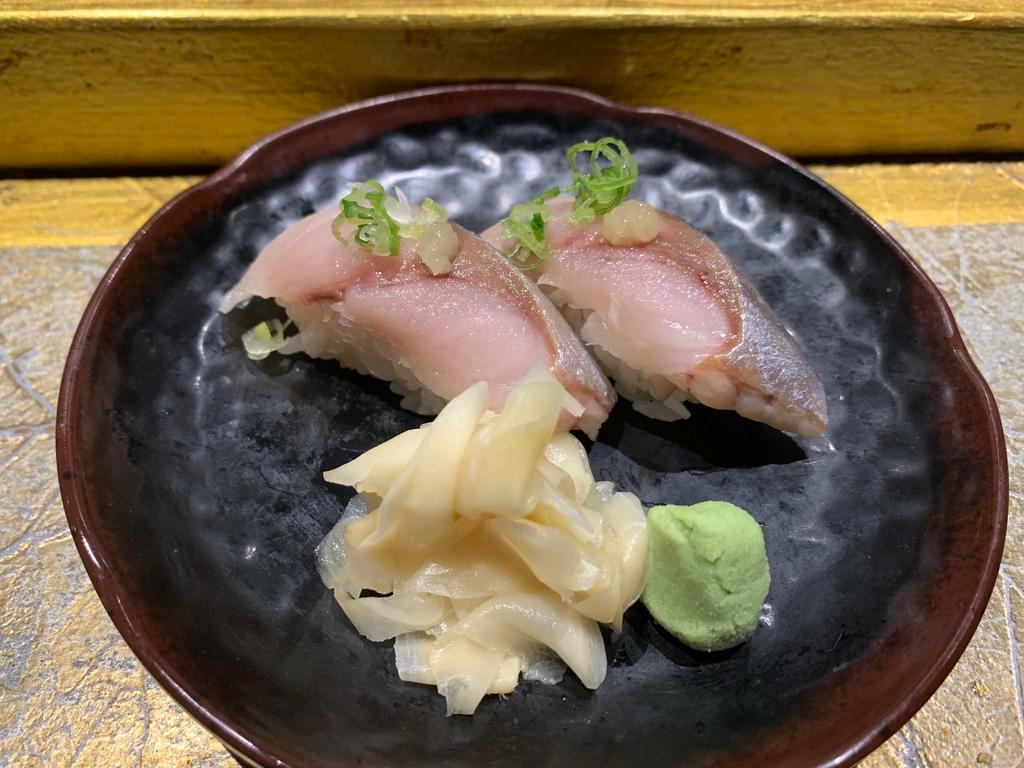 Saba Nigiri · It is rich and has a strong flavor. Saba is usually cured for many hours with salt and vinegar before being served as sushi.