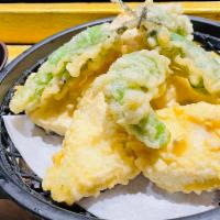 Fish Tempura (K-72) - New Item! · Deep Fried Snapper filet with seasonal Sauce and Shiso Leaf.