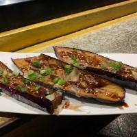 Nasu Dengaku(K-4) · Grilled eggplant with sauce and bonito flakes.
