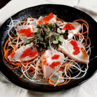 Albacore Tataki · Seared white tuna with daikon and tataki sauce.
