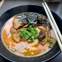 Spicy Black Garlic Oil Tonkotsu CHA-SHU Ramen(K-28) · Japanese cha shu, fried garlic , kikurage and seaweed, spicy soup base.