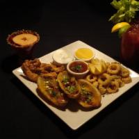 Combination Platter · Chicken tenders, potato skins, and calamari.