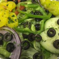 Dinner Salad · Mixed greens, tomatoes, onions, green peppers, cucumbers, black olives.