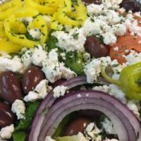 Greek Salad · Feta, Kalamata olives, mixed greens, tomatoes, onions, green peppers, cucumbers, black olive...