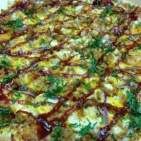 BBQ Chicken Pizza · Chicken, red onions, BBQ sauce, mozzarella cheese and sprinkles with cheddar cheese.