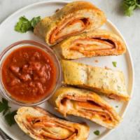 Stromboli · Ham, pepperoni, green peppers and onions, filled with mozzarella cheese. 