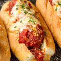 Big Easy  · Meatball Parmesan. Italian meatballs, covered in marinara sauce and topped with melted mozza...