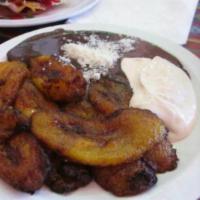 Maduros con Queso · Sweet plantains with creole cheese and salad.