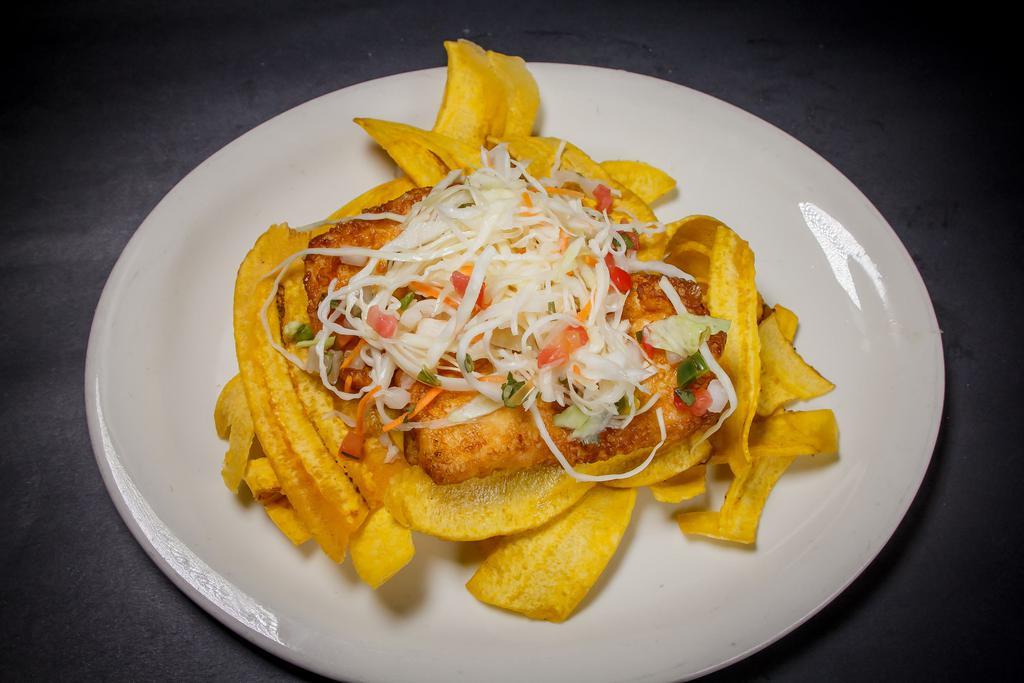 Tostones o Maduros con Queso Frito · Plantain medallion or sweet plantains with fried cheese and cabbage salad.