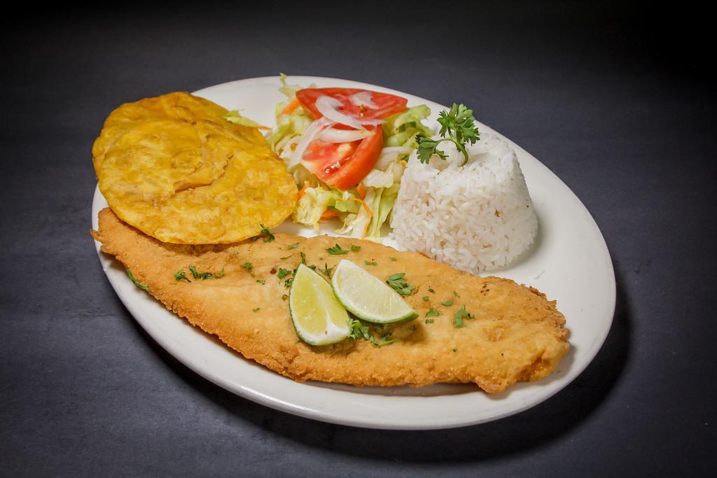 Breaded Fish Filet · Breaded fish filet with rice and salad.