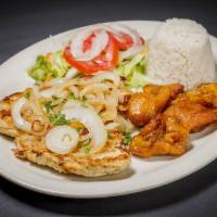 Grilled Chicken Breast · Chicken steak made on the grill serve with onions, fry banana (maduros) salad, rice or gallo...