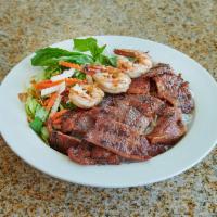 33. Bun Thit Nuong · Honey lemongrass pork or chicken. Vermicelli noodles with grilled marinated pork or chicken,...