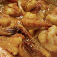 Camarones en Chipotle · Jumbo shrimps in chipotle sauce. Your choice of any two sides.