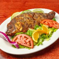Mojarra Frita · Large Fried tilapia with your choice of any two sides.