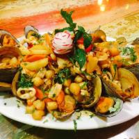 Paella Mexicana · Large Mexican seafood platter of mussels, clams, shrimps, fish, calamari and scallops over M...