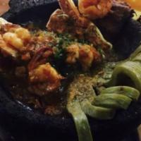 Molcajete Paisa · Large platter of Grilled steak, chicken breast, shrimps, chorizo, cactus, green onions, avoc...