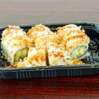 Sakura Roll · Shrimp tempura and cucumber inside, topped with spicy crab, tempura flake and eel sauce.