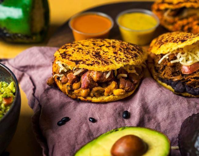 2 Steak Signature Arepas · Grilled Steak, Black Eyed Peas, Caramelized Onions & White Cheese
**Consumer Advisory: STEAK MAY BE SERVED RAW OR UNDERCOOKED. CONSUMING RAW OR UNDERCOOKED STEAK MAY INCREASE YOUR RISK OF FOODBORNE ILLNESS**