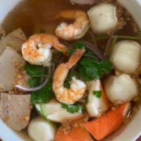 19. Seafood Noodle Soup · Savory light broth with noodles. 