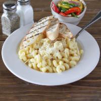 Mac and Cheese (Vegan or Vegetarian) · Made To Order, Served With Side Of Sauteed Veggies & Baguette.  

Vegan cheese sauce and/or ...