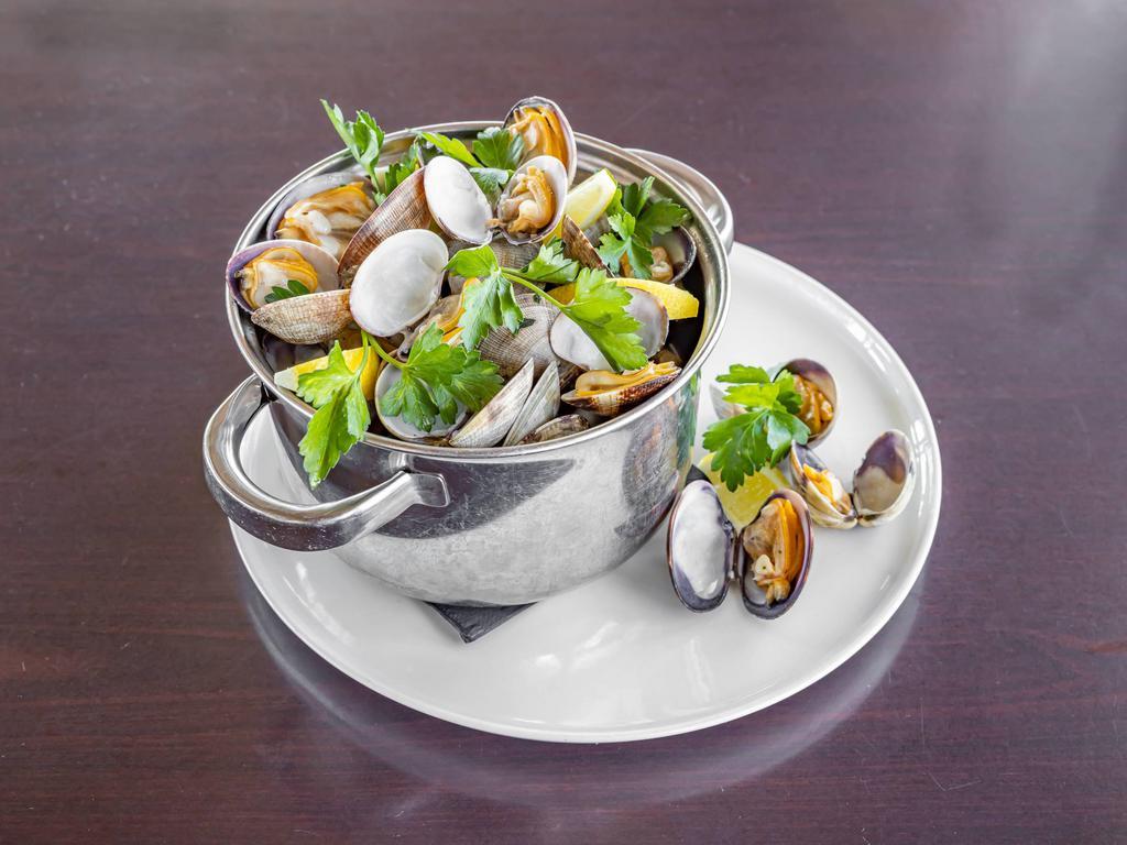 Manila Clams · White wine, garlic butter and aromatic natural broth.
