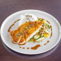 Chilean Sea Bass · Miso mirin glaze, Asian vegetables and steamed white rice.
