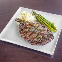 16 oz. Bone-In Ribeye Steak · Yukon gold mashed potatoes and steamed asparagus.