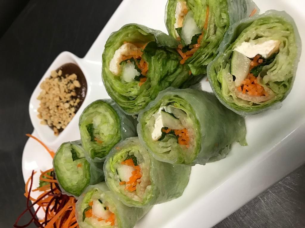 Summer Rolls · Rice pepper, lettuce, cucumber, mint,carrot and fried tofu served with tamarind sauce top with  ground peanut.