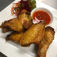 5 Chicken Wings · Served with spicy sweet chili sauce.