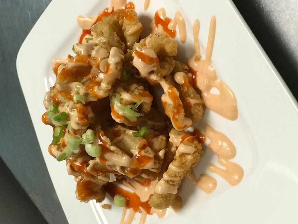 Spicy Calamari · Served with spicy mayo sauce and scallion on top. Medium spicy.