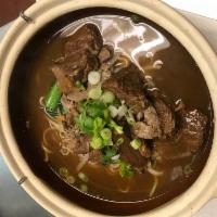 Beef Noodle Soup · Dark soup with bean sprout, Chinese broccoli, scallion and cilantro -beef balls