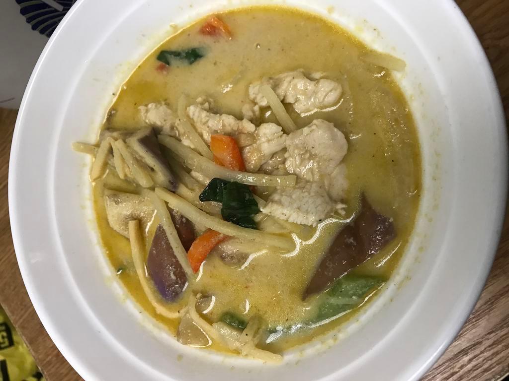 Green Curry · Served with spicy curry paste lightly sweetened, coconut milk, bell pepper, eggplant, bamboo shoots and basil leaves. Medium spicy. Served with jasmine rice.